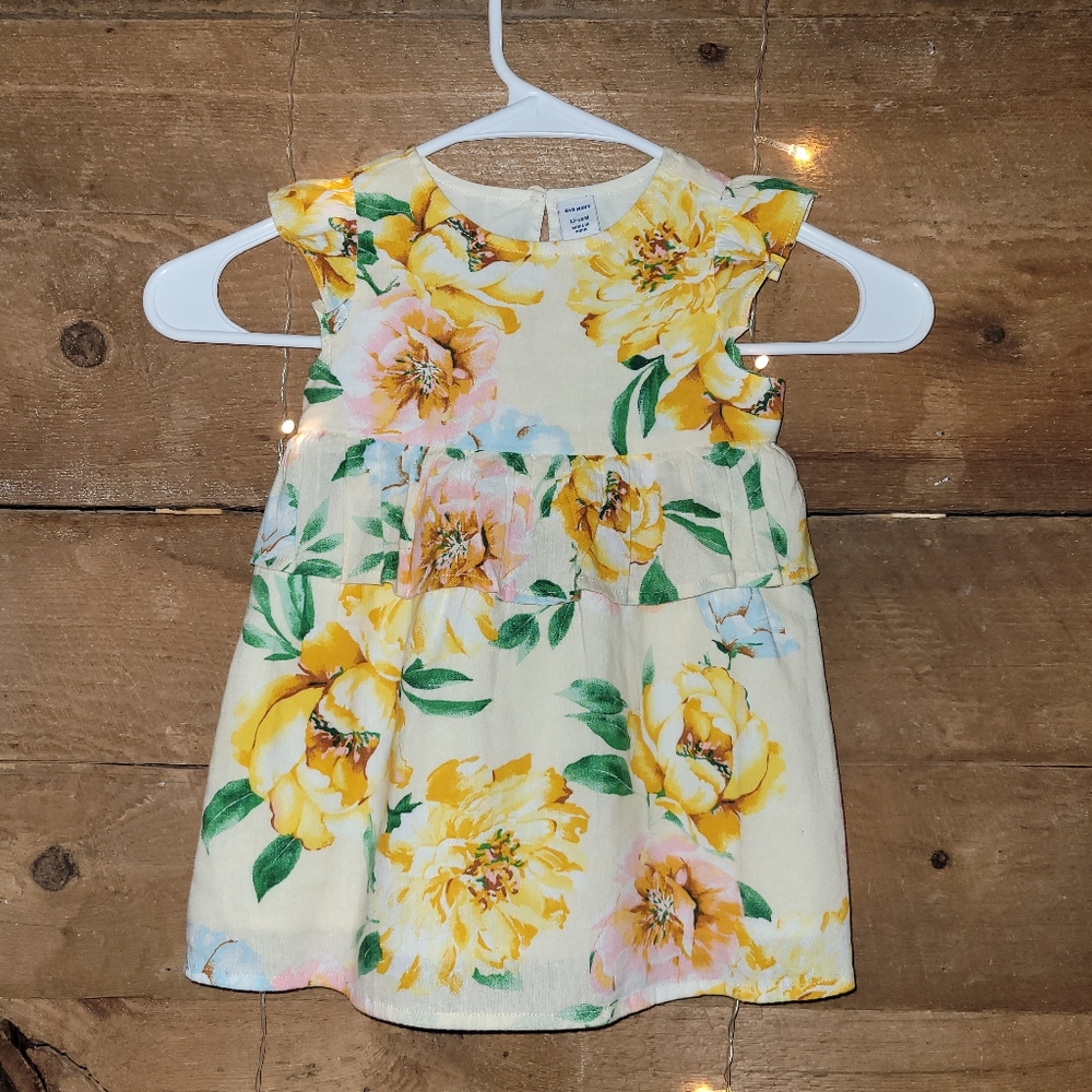 New, without tags baby girls dress size 12-18 months